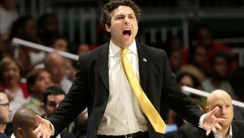 Georgia Tech coach Josh Pastner gestures during the second half of the team's NCAA college basketball game against Miami, Wednesday, Feb. 15, 2017, in Coral Gables, Fla. Miami defeated Georgia Tech 70-61. (AP Photo/Lynne Sladky)