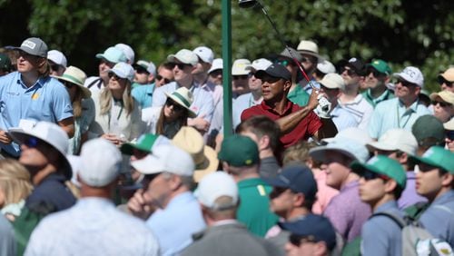 Tiger Woods tees off on ninth hole during the final round of the 2024 Masters Tournament at Augusta National Golf Club, Sunday, April 14, 2024, in Augusta, Ga. Jason Getz / Jason.Getz@ajc.com)
