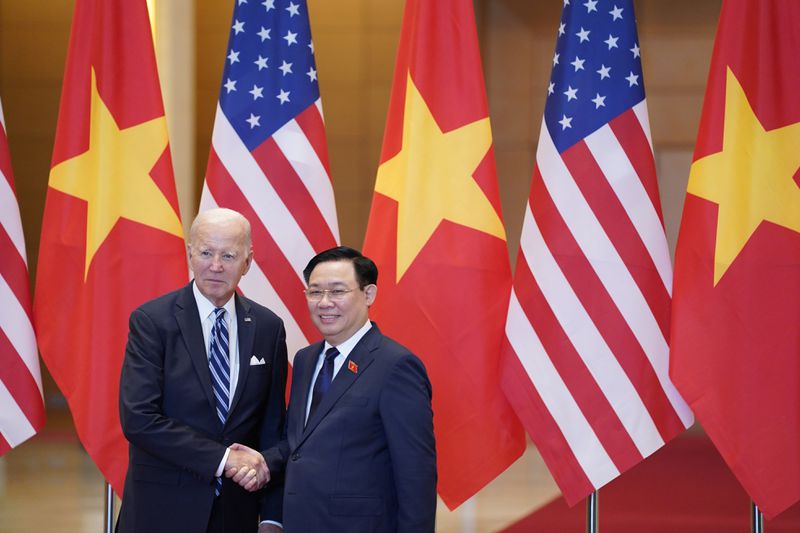 FILE - U.S. President Joe Biden, left, meets with Chairman of the National Assembly of Vietnam, Vuong Dinh Hue in Hanoi, Vietnam, Monday, Sept. 11, 2023. Vietnamese state media outlet VN Express reports that the head of Vietnam’s Parliament, Vuong Dinh Hue, has resigned. He is the latest member of senior government to leave office amid an ongoing anti-corruption campaign. (AP Photo/Evan Vucci, File)