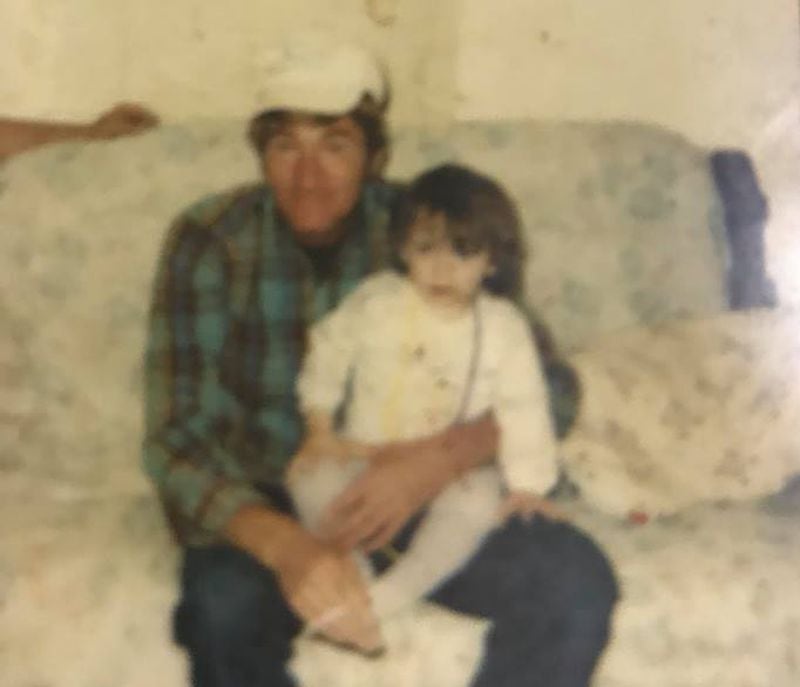 Donald Luke Bratcher and granddaughter Jessica Christian in an undated family photo. Bratcher was murdered in Elbert County in 1995. (Family photo)