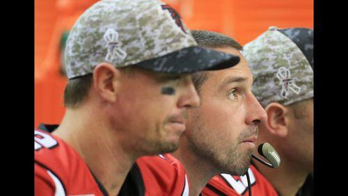 Falcons quarterback Matt Ryan and offensive coordinator Kyle Shanahan during the 24-21 loss to the Colts on Sunday. (Curtis Compton/AJC)