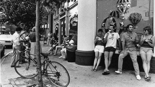 1983 -- Virginia Highlands residents enjoy some ice cream on a hot day. CHERYL BRAY / AJC FILE