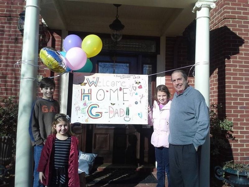 Lance Cunha got a warm welcome home following his heart transplant from three of his grandchildren, Micah Rodman (from left), Emory Rodman and Olivia Rodman. Contributed