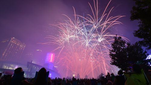 Fireworks light up downtown Atlanta’s skyline during the July Fourth celebration last year at Centennial Olympic Park. With the holiday comes discussion of what patriotism means to each of us. HYOSUB SHIN / HSHIN@AJC.COM