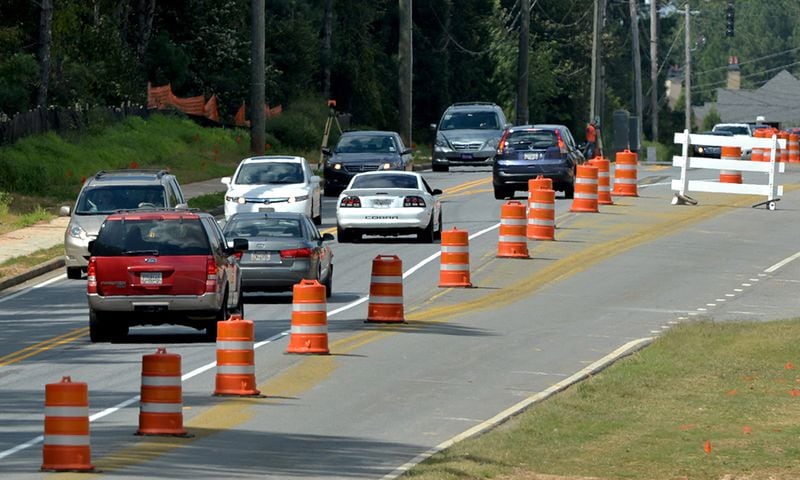 Construction on Old Alabama Road in Johns Creek is just one construction project  slowing traffic  in the area.  (BRANT SANDERLIN / BSANDERLIN@AJC.COM)
