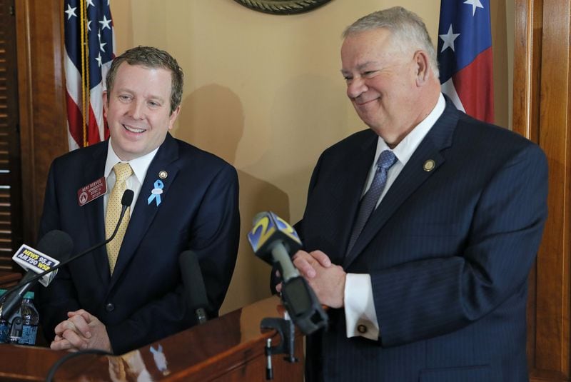 2/5/18 - Atlanta - Rep. Bert Reeves (left), R - Marietta, sponsor of HB 159, the adoption bill, and house speaker David Ralston, react to the passage of the bill during a press conference after the senate vote.  he Georgia Senate passed a compromise over a major overhaul to make adoptions easier in the state. BOB ANDRES  /BANDRES@AJC.COM
