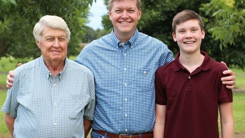 Roy Goodson (left) and his son David Goodson are hoping David’s son Drew one day will take the reins at Goodson Pecans. CONTRIBUTED BY SARAH PRICE