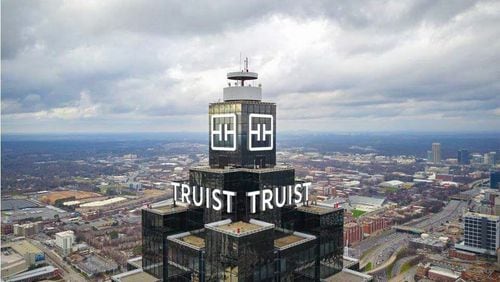 Truist will install its name on top of the city's second-tallest building starting Jan. 22, 2022. The company's logo has already been added to the 303 Peachtree St. building, known as Truist Plaza. (Handout)