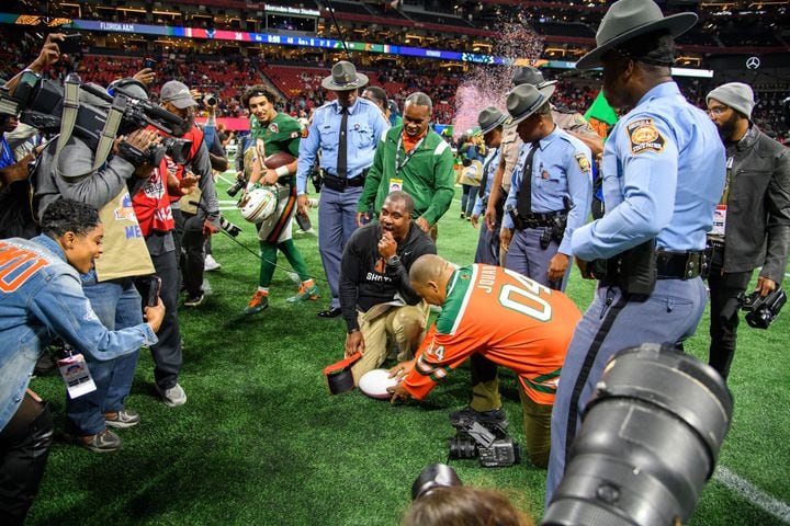 Willie Simmons, head coach for Florida A&M, takes in the win at the Celebration Bowl, Howard University versus Florida A&M, at Mercedes Benz Stadium in Atlanta, Georgia on December 16, 2023. (Jamie Spaar for the Atlanta Journal Constitution)