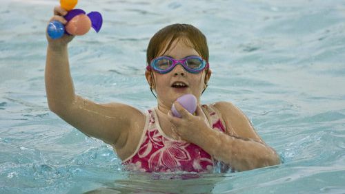 Hannah Harden, of Grayson, does her Easter egg hunting in her swimsuits at the Underwater Easter Egg Hunt at Bethesda Park Aquatic Center in Lawrenceville.