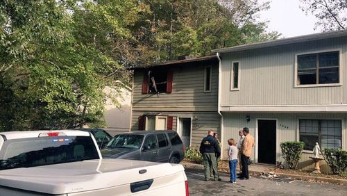 A man faces felony murder and arson charges in connection with a deadly condo fire in Austell, authorities said.
