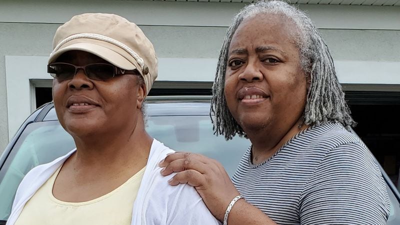 Janese Cockfield (left) and her twin, Janice Cockfield, outside their sister Sheila's house in Ormond Beach, Florida, on September 15, 2020. The twins were heading back to Atlanta after taking a road trip to Miami to visit siblings who'd not yet seen Janice since her COVID-19 recovery. "Janice didn’t feel well most of the time, but she pushed through," Janese said. (Credit: Sheila Cockfield / Contributed)