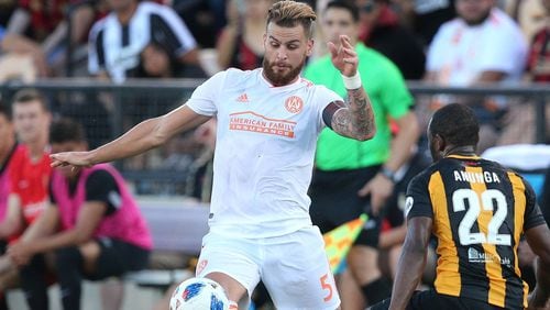 Atlanta United defender Leandro Gonzalez Pirez takes it away from Charleston Battery during the first half in a U.S. Open Cup match on Wednesday, June 6, 2018, in Kennesaw.  Curtis Compton/ccompton@ajc.com