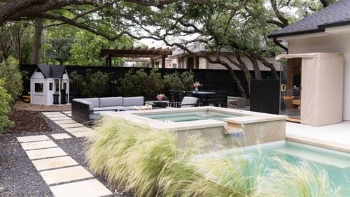 More homeowners are creating wellness areas in their backyards, said Yardzen CEO Allison Messner. This yard features a sauna, a narrow plunge pool and a hot tub, all in a relatively compact space. Photo: Courtesy of Nicole Mlakar for Yardzen