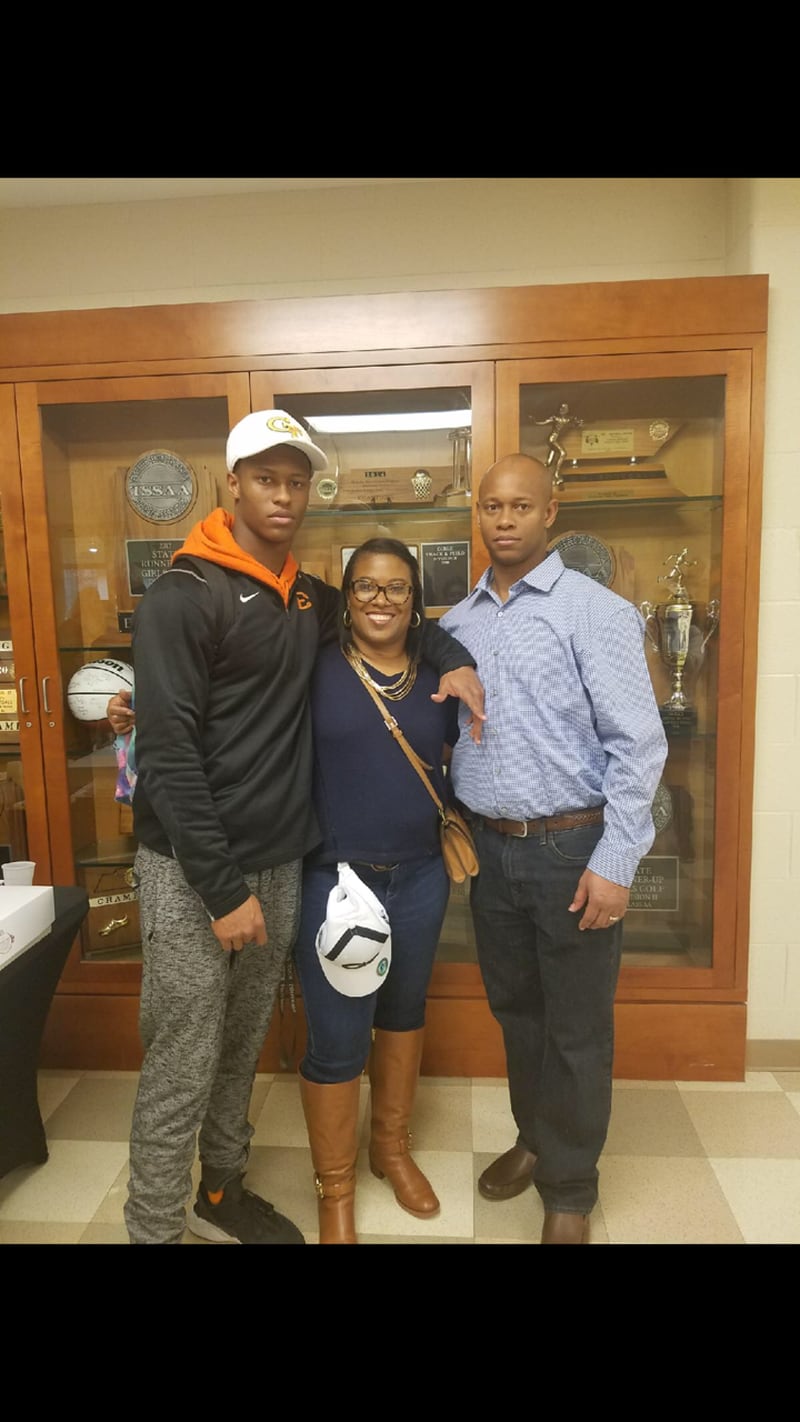Georgia Tech incoming freshman Jaylon King with his mother Scheniquah and his father Jeff at his signing day at Ensworth. King's father Jeff ran track and studied engineering at Tennessee State. (Courtesy Scheniquah King)