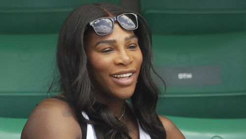 Serena Williams watches her sister Venus Williams' match against Japan's Kurumi Nara Wednesday at Roland Garros.