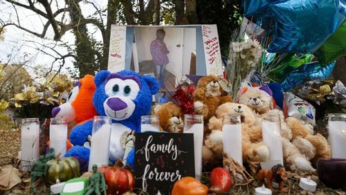 Teddy bears, mementos, and balloons make up a makeshift memorial at the site of Monday’s fatal school bus crash in Chattanooga, Tenn. The crash killed five Woodmore Elementary stuudents. (Doug Strickland / Chattanooga Times Free Press via AP)