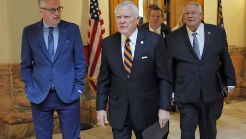 3/5/18 - Atlanta - Gov. Nathan Deal, Lt. Gov. Casey Cagle, House Speaker David Ralston and Rep. Bert Reeves head to a ceremony where Gov. Nathan Deal signed the adoption bill Reeves authored. BOB ANDRES /BANDRES@AJC.COM