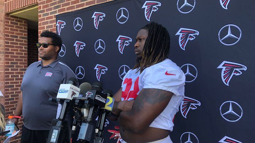 Falcons defensive end Takk McKinley during his brief interview with the local media on Thursday. (By D. Orlando Ledbetter/dledbetter@ajc.com)