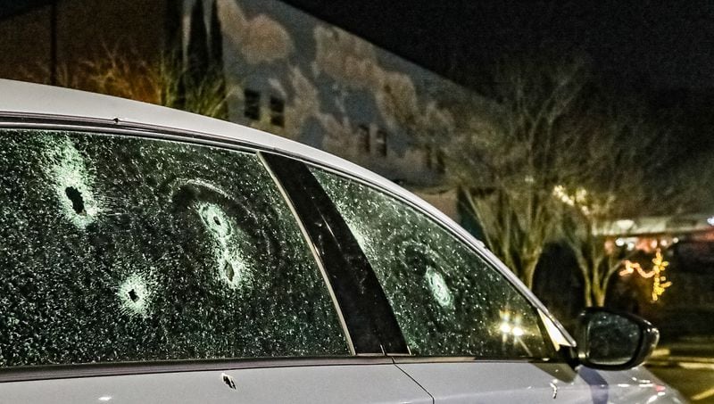 At least two vehicles were damaged by bullets Sunday night when gunfire rang out in the parking lot of Loca Luna on Amsterdam Avenue. 