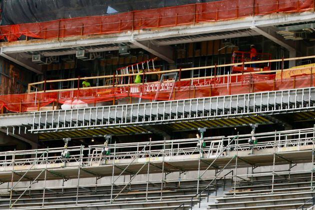Construction workers were spotted carrying out renovations at Sanford Stadium on Monday, April 29, 2024. The renovations involve expanding the 100-level south sideline concourse, establishing the 50-Yard Line Club, and constructing a new press box with premium seating options.
(Miguel Martinez / AJC)