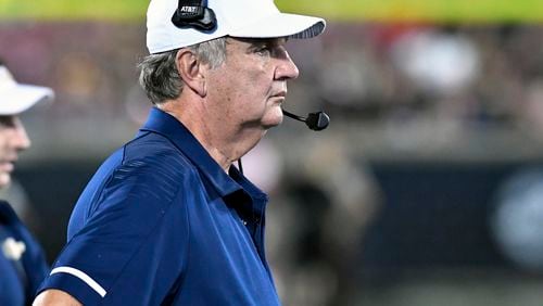 Georgia Tech head coach Paul Johnson watches from the sideline during the first half of an NCAA college football game against Louisville, Friday, Oct. 5, 2018, in Louisville, Ky. (AP Photo/Timothy D. Easley)