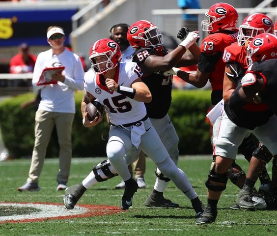 Carson Beck breaks away on a quarterback keeper during the G-Day game on Saturday, April 13, 2024.  Curtis Compton for the Atlanta Journal Constitution