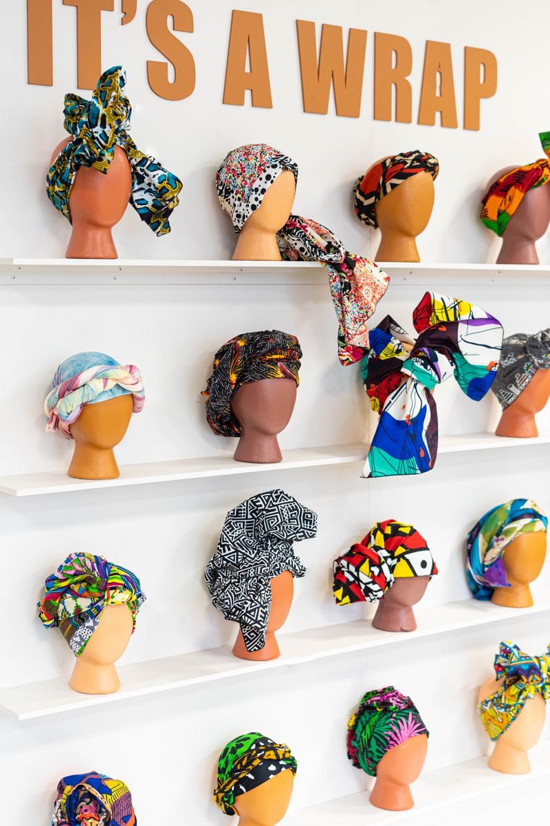 Shelves lined with colorful hair wraps at The Black Hair Experience.
(Courtesy of Elizabeth Austin Photography)
