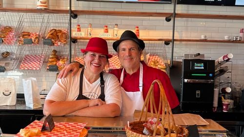 Julie Dragich (left) and Steven Novotny recently opened the Bronx Bagel Buggy in Chamblee after building a following for their New York-style bagels at metro Atlanta farmers markets. / Courtesy of Julie Dragich