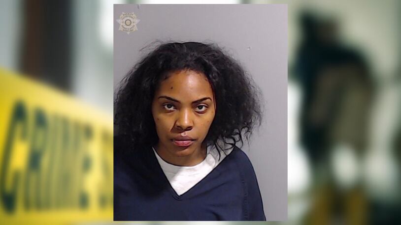 Nicole Jackson is charged with murder in the death and injury of her two daughters, officials said.