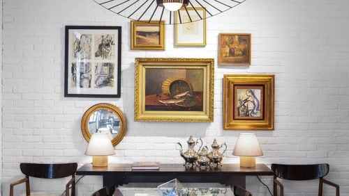 Hayes helped the owners of this historic Castleberry Hill loft with new furnishings and a fresh design. She mixed the couple’s art collection and silver tea service with a contemporary pendant and mid-century dining chairs to create a modern entertaining space. Contributed by Chad Mellon