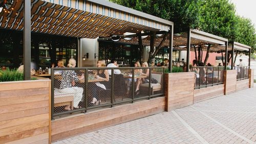 King + Duke has a well-appointed patio that overlooks one of Buckhead’s busiest intersections. CONTRIBUTED BY ANDREW THOMAS LEE