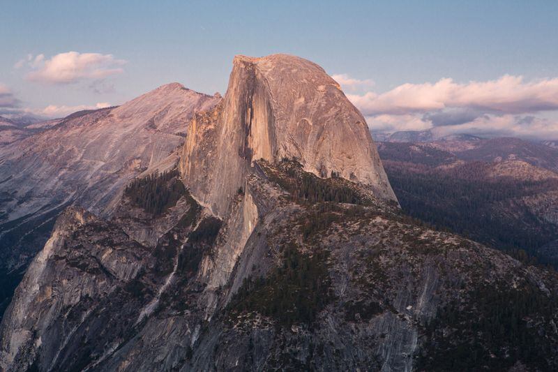 
                        FILE — A view of Half Dome from Glacier Point at Yosemite National Park in California in October in 2018. osemite is reinstating a timed-entry system it instituted in 2020, but paused in 2022. (Beth Coller/The New York Times)
                      