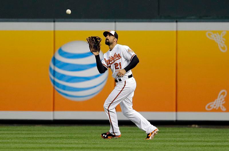 FILE - In this June 10, 2014, file photo, Baltimore Orioles right fielder Nick Markakis prepares to catch a fly ball during a baseball game against the Boston Red Sox in Baltimore. Markakis and the Atlanta Braves have agreed to a four-year contract, pending a physical. The team announced the move Wednesday, Dec. 3, 2014. (AP Photo/Patrick Semansky, File) He's a good glove man. I'll grant that. (Patrick Semansky/AP photo)