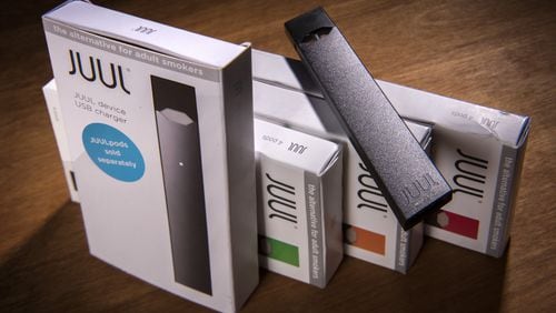 A Juul vaping system with accessory pods in various flavors. (PHOTO by Bill O’Leary / Washington Post)
