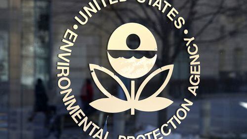 The U.S. Environmental Protection Agency's logo is displayed on a door at its headquarters in 2017 in Washington, D.C. (Justin Sullivan/Getty Images/TNS)