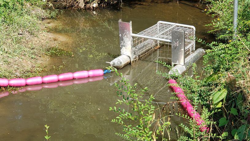 A LItter Gitter in Proctor Creek is part of a plan to reduce the amount of trash floating in the creek.