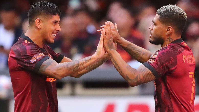 Atlanta United forward Josef Martinez (right) celebrates with teammate Alan Franco after scoring the only goal of the match against Los Angeles FC during the second half Sunday, Aug. 15, 2021, at Mercedes-Benz Stadium in Atlanta. (Curtis Compton / Curtis.Compton@ajc.com)