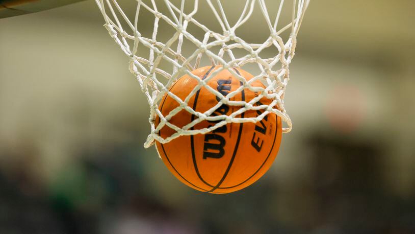 General view of a basketball going through a hoop before the game between Buford and Duluth during the first round game of the GHSA Class 7A girls playoffs, on Tuesday, Feb. 21, 2023, in Buford, Ga.. Jason Getz / Jason.Getz@ajc.com)
