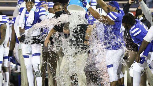Georgia State head coach Shawn Elliott is dunked with water near the end of the game against Western Kentucky in the LendingTree Bowl on Saturday, Dec. 26, 2020, at Ladd-Peebles Stadium in Mobile, Ala. (Mike Kittrell/AL.com)