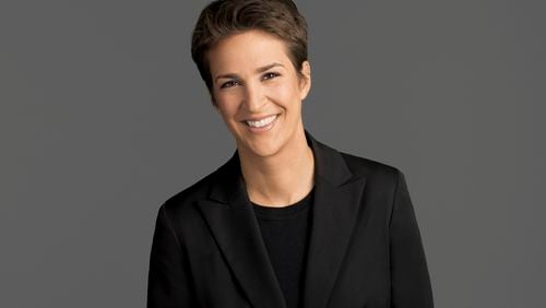 This image released by NBC shows Rachel Maddow, host of "The Rachel Maddow Show," on MSNBC. Maddow was at the center of the political media universe Tuesday, March 14, 2017, with a story on President Donald Trump’s tax returns. (MSNBC via AP)