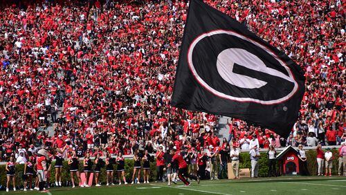 The Black team runs out onto the field during Georgia's G-Day game Saturday, April 21, 2018, at Sanford Stadium in Athens.