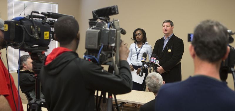GBI spokeswoman Nelly Miles (left) and Henry County Sheriff Keith McBrayer brief the media on a deadly officer-involved shooting in Locust Grove. (Credit: Phil Skinner)