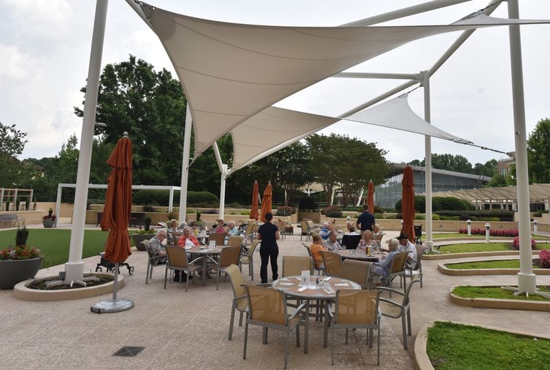Tim’s Terrace, an al fresco restaurant open from May to October at Lenbrook Atlanta. Residents of the Buckhead senior living community also can order room service from Lenbrook’s restaurants if they don’t feel like cooking in their own units. HYOSUB SHIN / HSHIN@AJC.COM