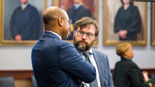 240306 MARIETTA, GA — (From left) Harold Melton, attorney for the city of Mableton, and Allen Lightcap, plaintiff’s attorney, chat during a break in a lawsuit hearing challenging the legality of the ballot question put to voters in 2022 to create the city of Mableton, at Cobb County Superior Court in Marietta, Ga., on Wednesday, March 6, 2024. The new city was created and is in the process of transitioning services now, so if the court rules the city was created illegally, it could theoretically undo the city altogether. 
(Bita Honarvar for The Atlanta Journal-Constitution)