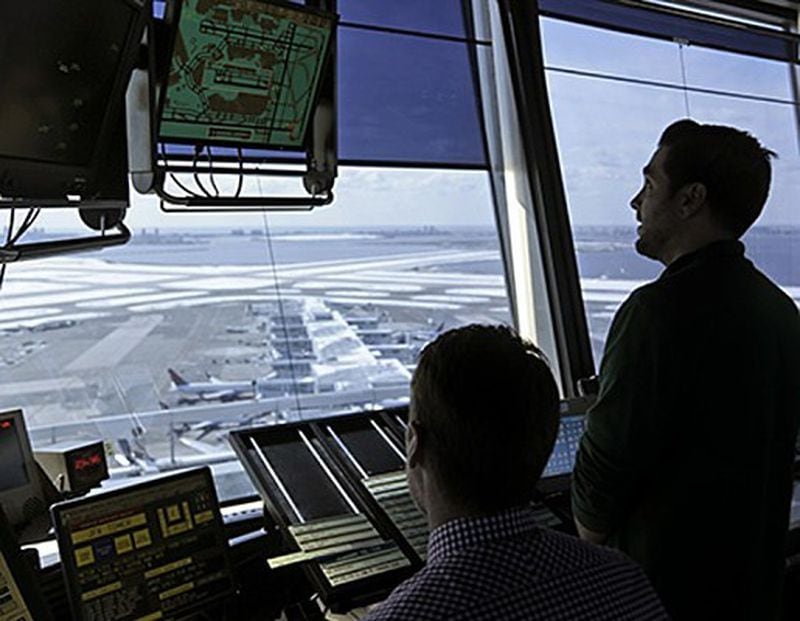 An associate's degree and extensive on the job training are typically required for an air traffic controller's job.