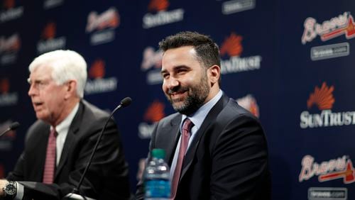 Terry McGuirk and Alex Anthopoulos.