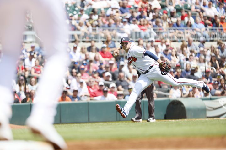 Braves third baseman Austin Riley is unable to make a play after catching a ground ball during the first inning gainst the Astros at Truist Park on Sunday, April 23, 2023, in Atlanta. 
Miguel Martinez / miguel.martinezjimenez@ajc.com 
