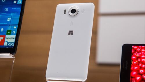 A new phone titled the Microsfot Lumia 950 sit on display at a media event for new Microsoft products on October 6, 2015 in New York City. (Photo by Andrew Burton/Getty Images)