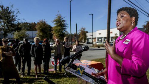 November 15, 2021 Atlanta:  Atlanta City Council President Felicia Moore laid out in detail her vison for Atlanta on Monday, Nov. 15, 2021 at 2600 Bolton Road in Atlanta in what she described as a former “Food Desert” referring to the Publix and adjoining stores nearby that she helped get going. Moore surrounded by over a dozen supporters laid out her vision as she is headed to an Atlanta mayoral runoff election with Councilman Andre Dickens. (John Spink / John.Spink@ajc.com)